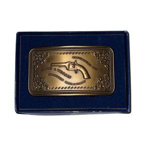Smith & Wesson Pistol Case Brass Belt Buckle Vintage 1980’s Model 670 Embossed